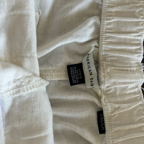 American Eagle Outfitters Ruffle Hem Cream Shorts - Picture 6 of 8